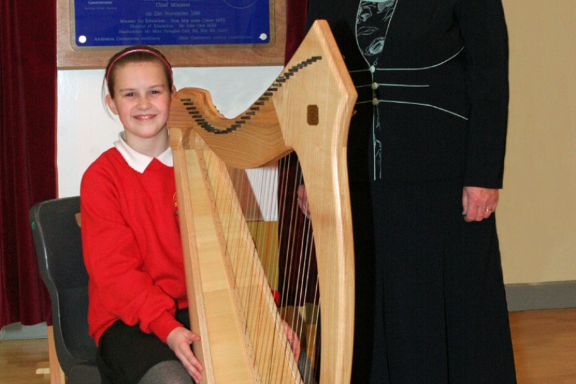 Harp pupil Amy Stoutt with the Chairman of the Foundation, Anne Craine, MHK.
