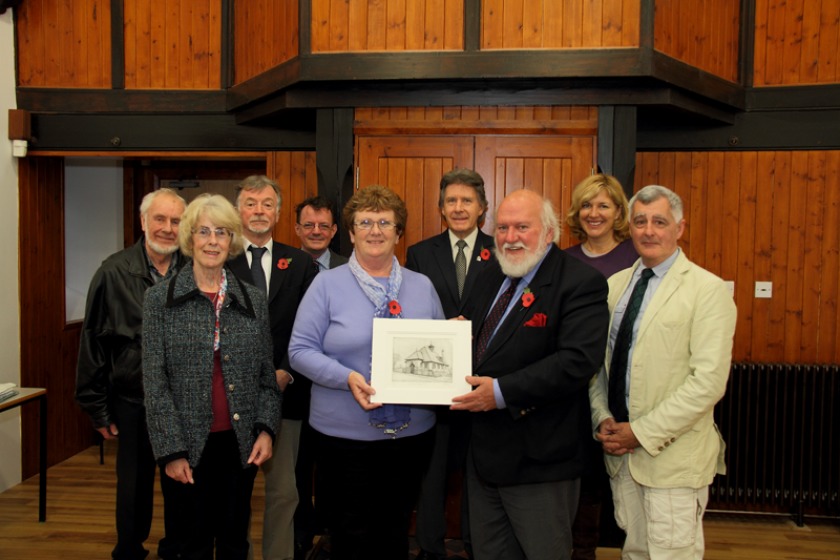 Mrs Anne Craine and members of the Foundation present an etching to Mr Peter Kelly