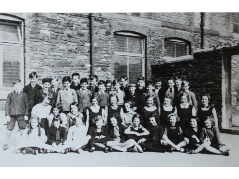 Murray's Road School, 1938. Mr Charles Corkill is standing 3rd from the right on the back row and is wearing a dark school tie. 