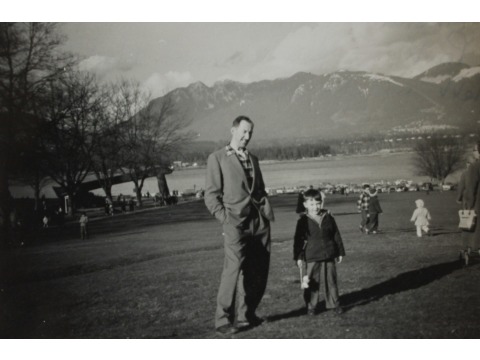 Mrs Joyce Kinley's husband Malcolm with their son Alastair in Stanley Park, Vancouver in March 1959. Lumberman's Arch in the background on the left