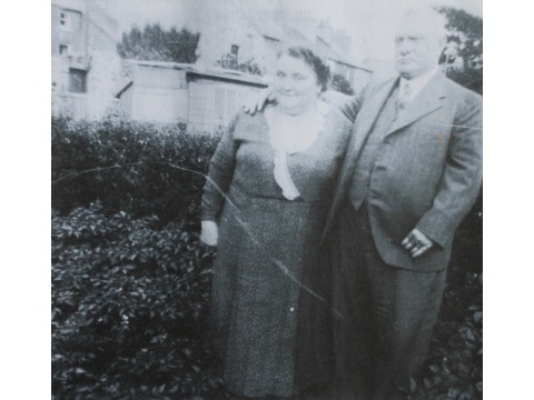 Photocopy of original photograph showing Mr Charles Corkill's grandparents Charles and Hannah Corkill, taken in the mid 1930s in Arbory Street, Castletown. Grandfather Charles Corkill was Coroner for Rushen Sheading for many years