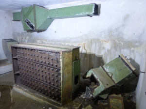 The inside of one of the bunkers today. The air filtration equipment is still largely intact.